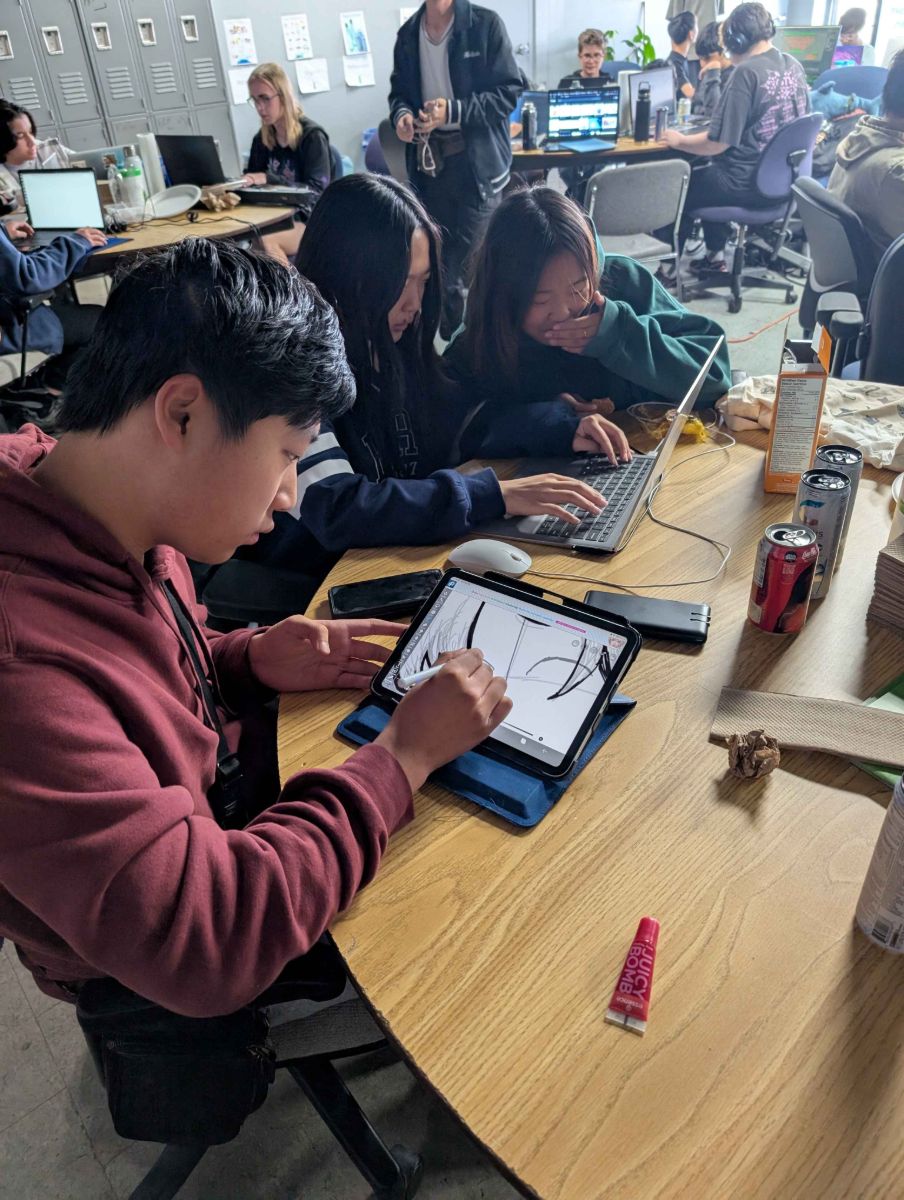 A participant drawing game art on a tablet