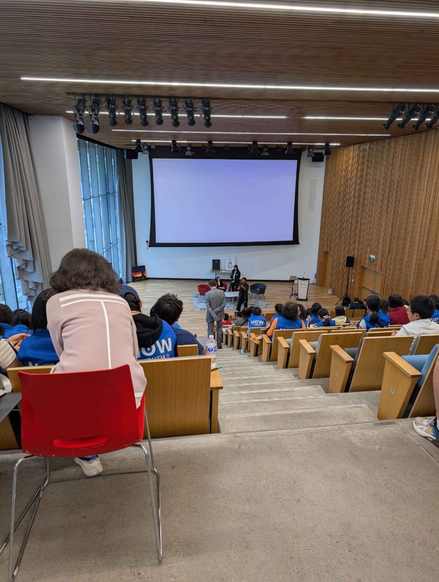 The forum auditorium with students seated facing the stage